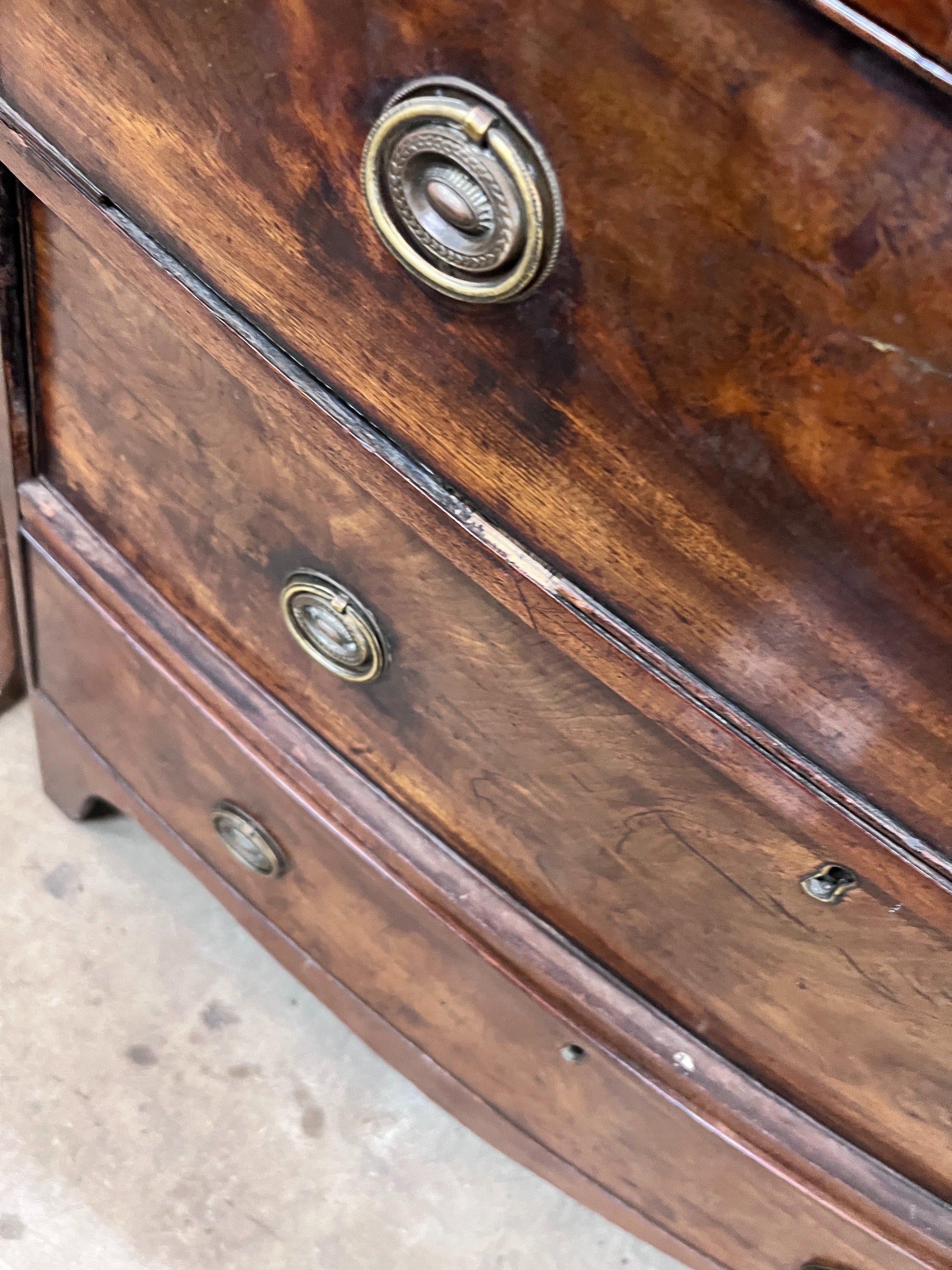 A small Regency banded mahogany three drawer bowfront chest, width 77cm, depth 43cm, height 77cm *Please note the sale commences at 9am.